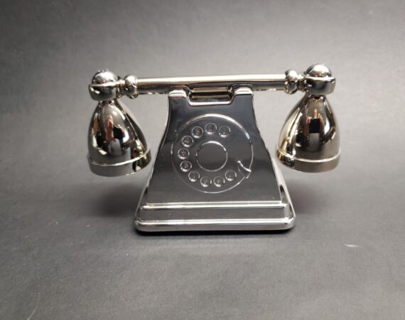 Nostalgic salt and pepper gift set recalls the look of antique rotary telephones.