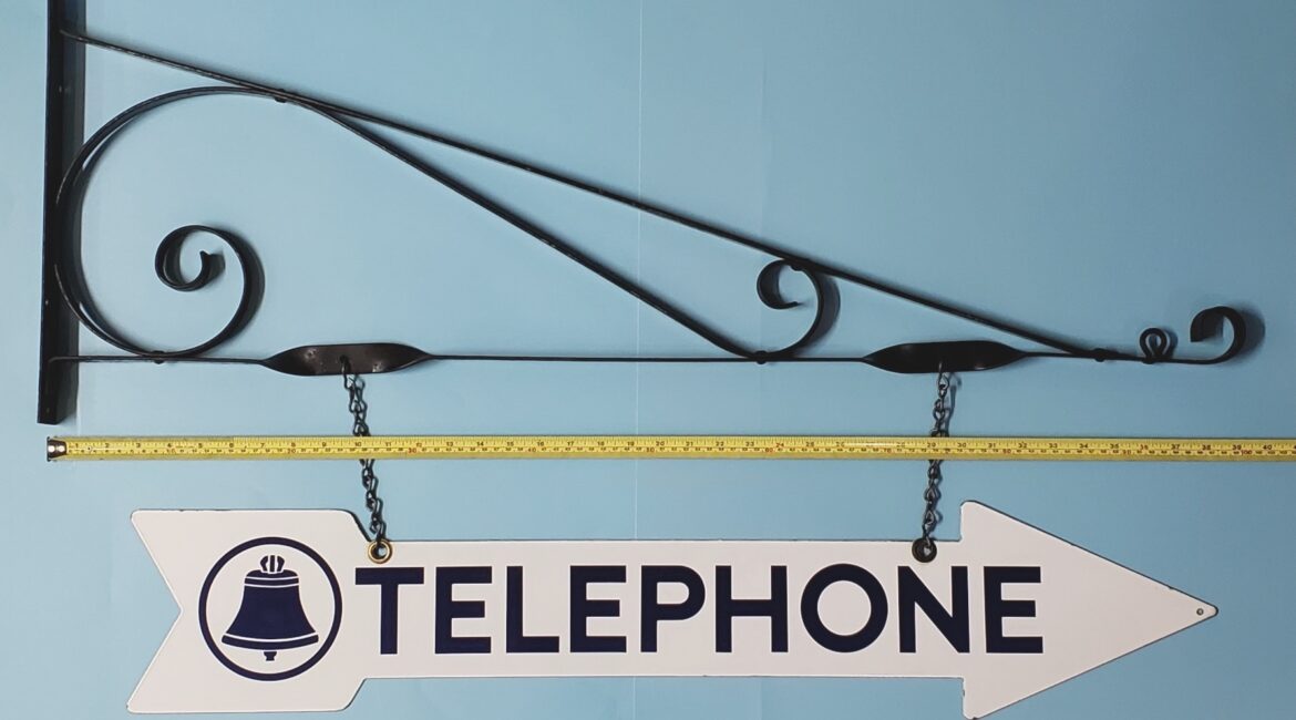 Bell System Porcelain Directional Arrow Telephone Sign with Bracket.